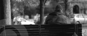 Homeless person on bench