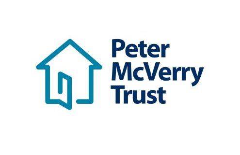 Peter McVerry Trust logo: teal house outline with an open door, next to bold dark blue 'Peter McVerry Trust' text.